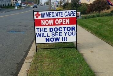 immediate-care-833-sidewalk-sign